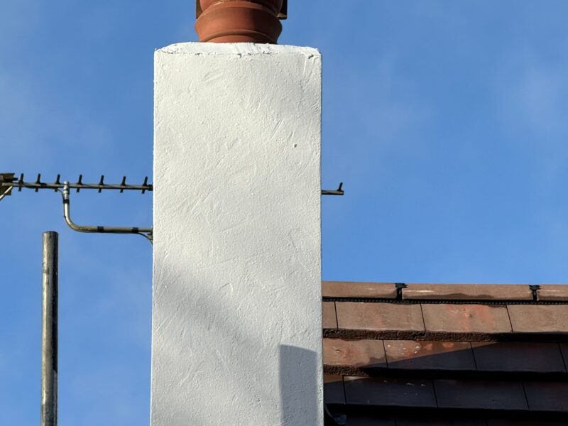 Rendered chimney with flaunched pots