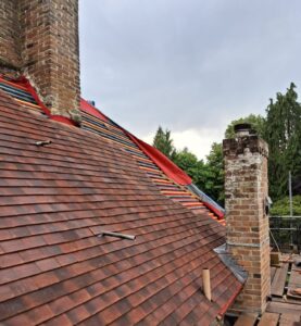Clay tile roof restoration of a 300-year-old manor by NFRC-accredited Armadillo Roofing. Check our verified reviews and see our expert craftsmanship.