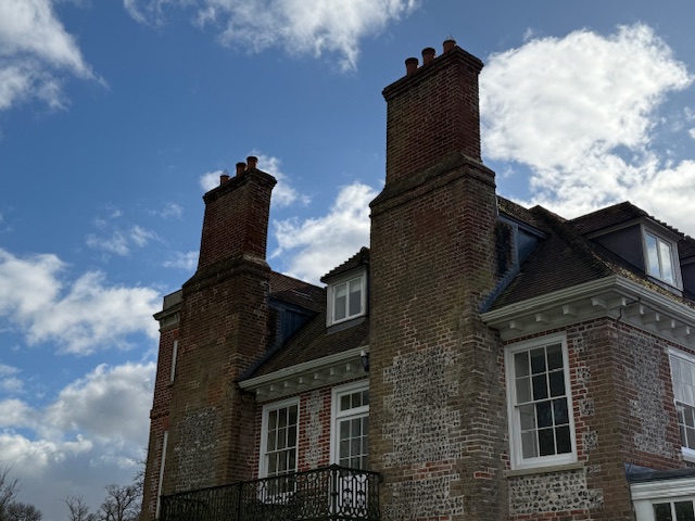 Tall manor house chimneys