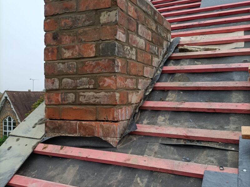 Repairing chimney ready for soakers and lead flashing